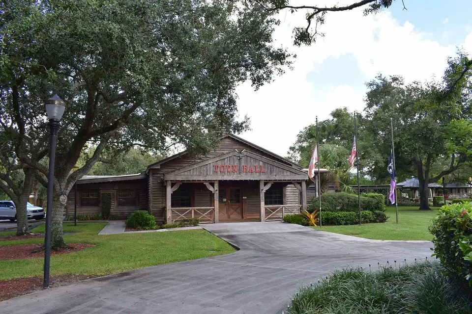 The Western-style Davie Town Hall under live oaks in Davie, FL